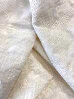 Elegante en verfijnde jacquardstof met reliëfborduursels in