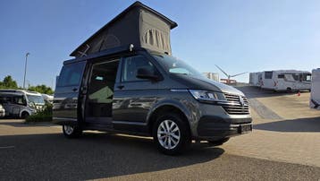 Volkswagen California met automaat en bed in hefdak 09085, Automaat, Buscamper of Camperbus, Volkswagen, Treinzit