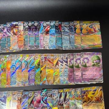 Pokémon - 100 Bulk kaarten - Dragonite, Gardevoir 100 Foil -