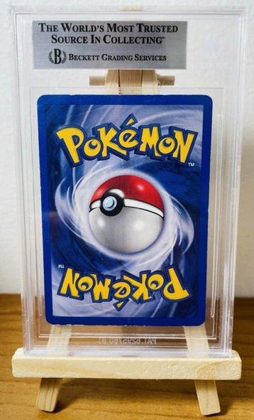 Pokémon - 1 Graded card - Houndoom 4/75 First edition, Foil