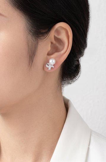 Oorbellen - 18 karaat Witgoud - 0.30ct. tw. Parel - Diamant