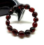 Armband met grote Baltische barnsteen kralen, 22,4 gram, in