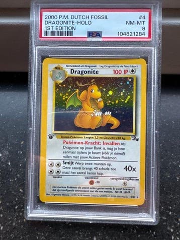 Pokémon - 1 Graded card - Dragonite #4 First edition, Foil -, Nieuw