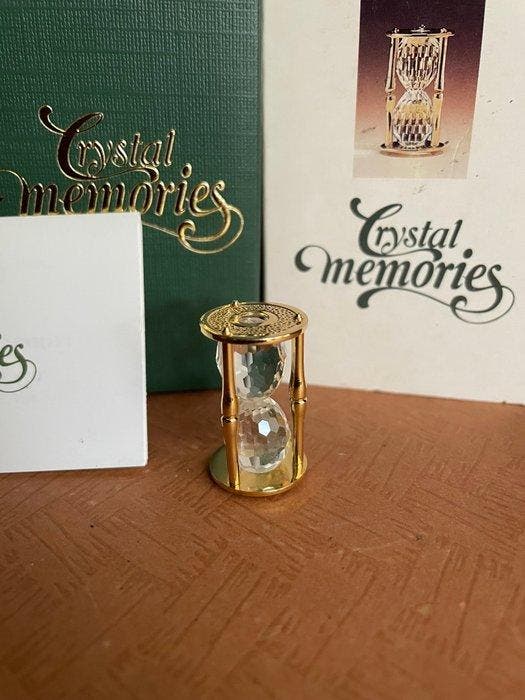 Swarovski - Beeldje - Memories Zandloper Goud - Boxed -, Antiek en Kunst, Curiosa en Brocante