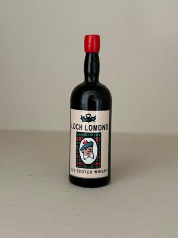 Pixi 5611 - Figurine - La bouteille de Loch Lomond - Les