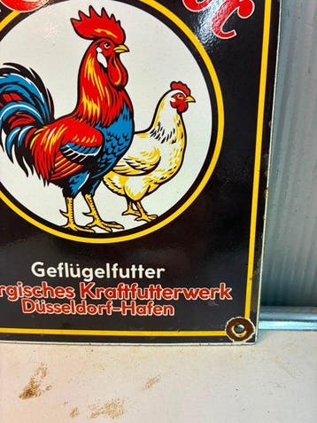 Muskator Geflügelfutter – Düsseldorf – Emaille Reclamebord -