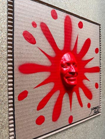 gregos - Red smiling splash on paperboard