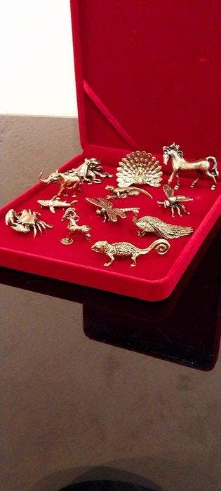 Porte couteau (12) - animaux exotiques - Laiton doré