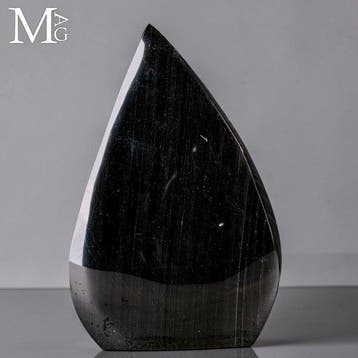 Glanzende zwarte obsidiaan met subtiele zilveren glans en