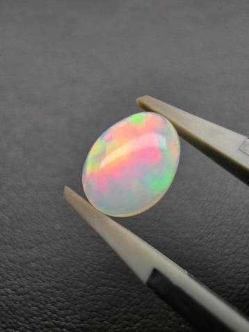 2.29cts White Opal Cabochon- 0.45 g