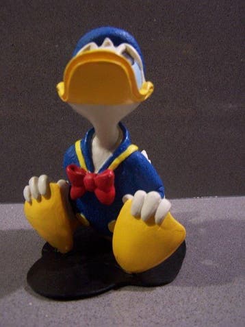 Enesco serie Its Donald onschuldig kijkend - 1 beeldje -, Nieuw