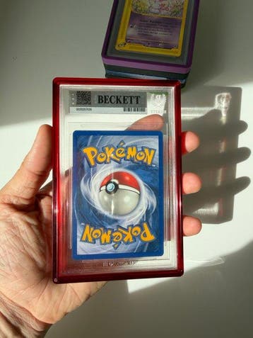 Pokémon - 1 Graded card - Dracaufeu 4 Première édition, Foil