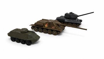 Vintage USSR die-cast metal toy model of the T-34, BTR-60,