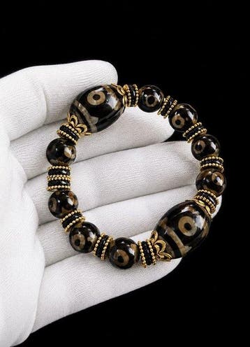 Exclusieve Tibetaanse armband met Dzi tijgertand - Ultieme, Verzamelen