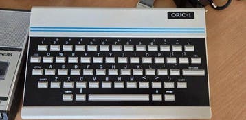 Oric-1 with games, magazines & accessories - Computer