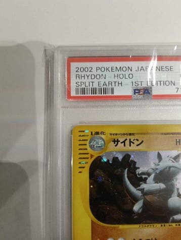 Pokémon - 1 Graded card - Rhydon #055 Foil, First edition,