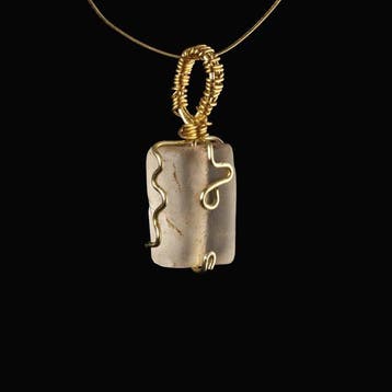 Oud-Romeins Pendant, met een draad omwikkelde Romeinse