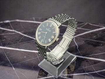 Universal Genève - White Shadow Date - Heren - 1970-1979, Handtassen en Accessoires, Horloges | Heren, Nieuw
