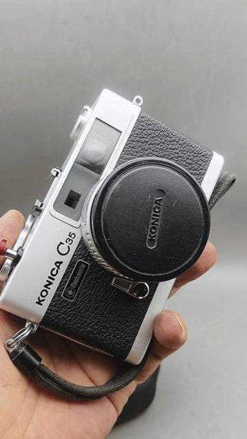 Konica C35 Flashmatic 35mm analog Meetzoeker camera (Zonder, Nieuw