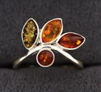 Bague exclusive en ambre – miel cognac verdâtre – forme