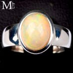 Reflets jaune-vert et veines orange - Bague avec opale de