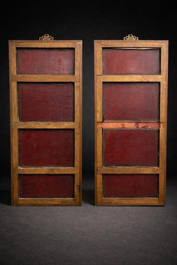 Een paar vintage Chinese houten panelen met parelmoeren