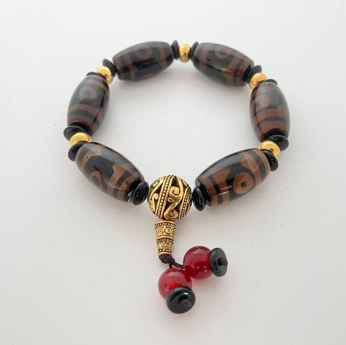 Dzi Stretch-Armband- 57 g, Verzamelen, Mineralen en Fossielen