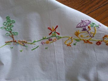 Delicaat lakenset met kussensloop voor het babybed, met