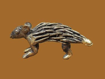 Weegt het figuurlijke goud af. Stekelvarken. - Abrammouo. -