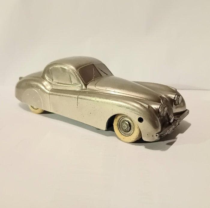 Parmeta - Jaguar XK120 - Opwindbare blikken auto - 1940-1949, Antiek en Kunst, Antiek | Speelgoed