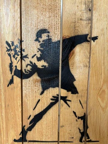 Banksy (1974) - Love is in the air (Flower thrower) - After