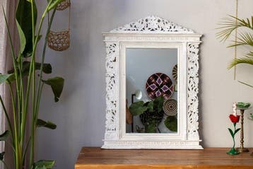 Spiegel- groene decoraties met bladeren, druiventrossen en