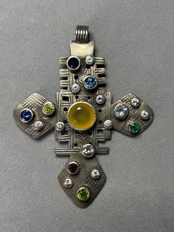 Contemporary pendant made out of a large old Ethiopian cross