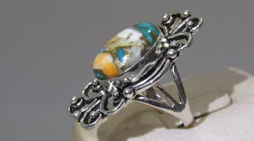 Turquoise ring - Hoogte: 25.8 mm - Breedte: 34.5 mm- 7.4 g -