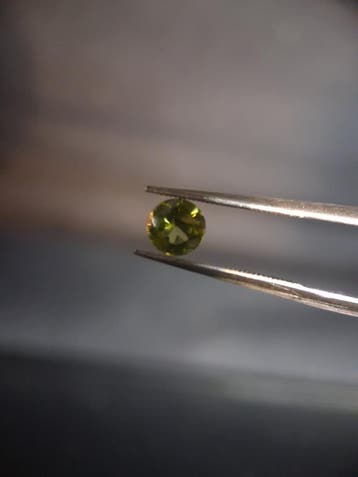 Natural Peridot - 0.515 ct - round - unheated- green peridot, Verzenden, Nieuw