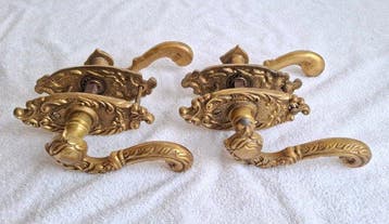 Louis XV Deurklink (2) - 1920-1930 - sierlijke gebogen