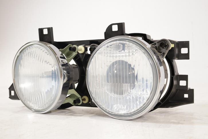 BMW E34 5 Serie OEM Koplamp HELLA links NIEUW! 1dl005000, Auto-onderdelen, Verlichting, Ophalen of Verzenden