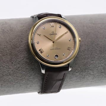 OMEGA - 34 mm, Stainless steel and yellow gold on a leather, Nieuw