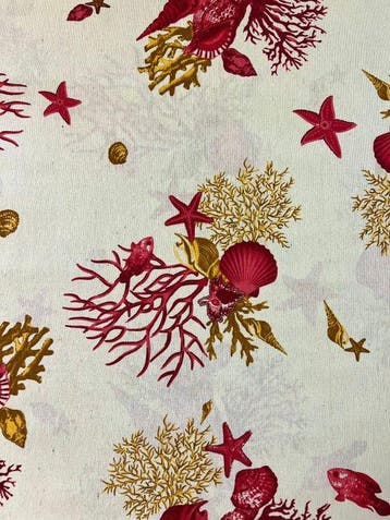 Elegante all-over mariene decoratieve stof met rode koralen.