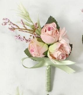 Luxe corsage zijdenroosje lichterroze groen boutonnière op
