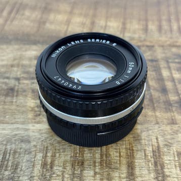 Nikon 50mm 1.8 E-serie nr. 2420, Audio, Tv en Foto, Fotocamera's Analoog, Ophalen of Verzenden, Gebruikt, Nikon