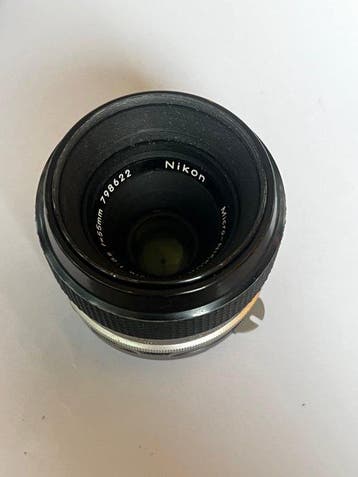 Nikon Nikkor-P.C Auto 55mm f/3.5 + AF Nikkor 28–70mm