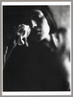 Edward Weston (1886–1958) - Tina with the white iris, 1921