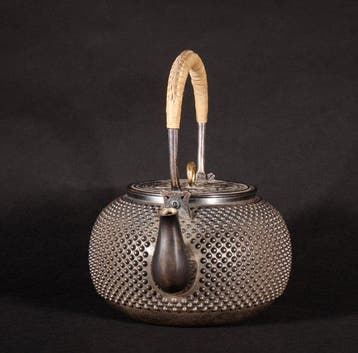Theepot - Zilver, handvat omwikkeld met rattan of bamboe