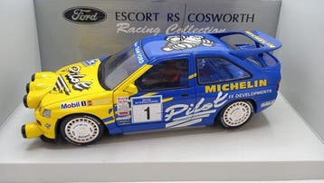 UT Models 1:18 - Modelauto - Ford Escort Michelin Champion -, Hobby en Vrije tijd, Nieuw