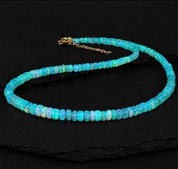 Collier dopale éthiopien bleu électrique – perles rondelles