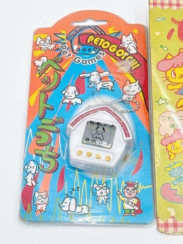 NACO - 1997 Pocket Love & Petogotchi Virtual Pet LCD