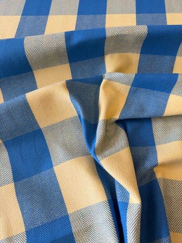 Stof met elegante visgraatbinding en een tweekleurig