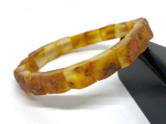 L’Héritage de la Terre : Bracelet chef-d’œuvre en ambre, Antiek en Kunst, Curiosa en Brocante