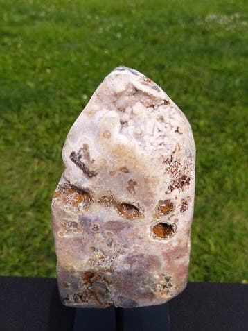 Roze en rode amethistgeode met roze amethist suikerdruse
